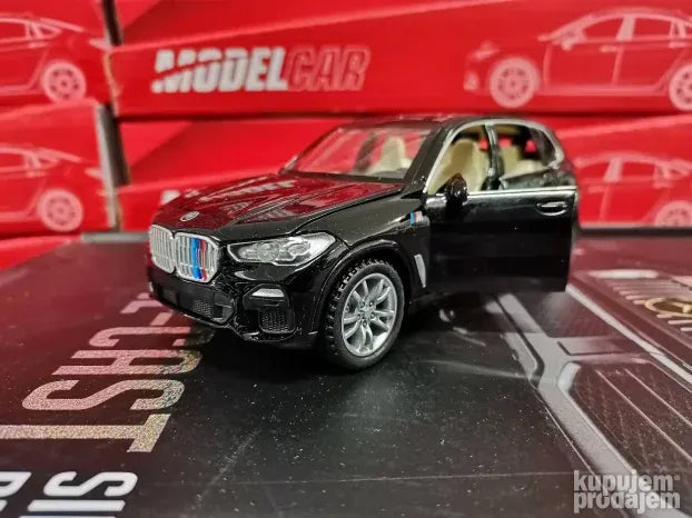 Die-cast BMW X5 crni, razmera 1:32, dužina do 20 cm