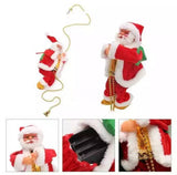 Muzička figura Deda Mraza koji se penje 26 cm