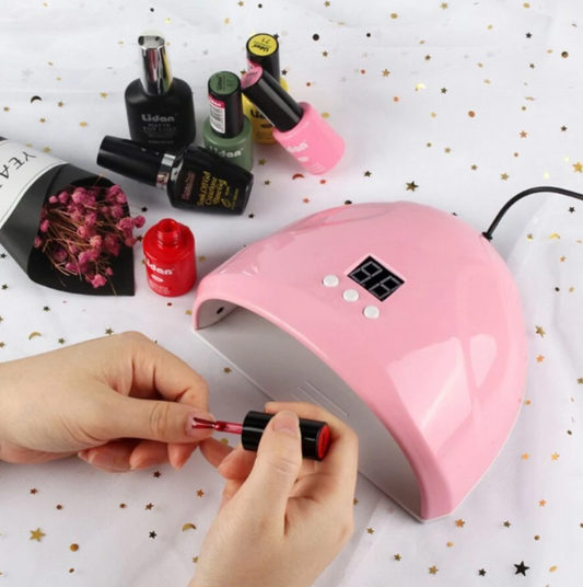 UV/LED lampa za nokte 36W Nail lamp Tajmer 30-60-99 sec Senzor Snaga 36W 12 UV/LED dioda Višenamenski USB punjač Čitajući displej Pink i Bela boja Gel lakovi Sušenje noktiju Manikir Precizno sušenje Automatsko paljenje i snižavanje svetla