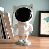 Galaxy projektor astronaut sa projekcijom zvezdanog neba