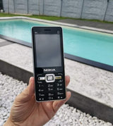 Telefon sa tri SIM kartice i menijem na srpskom