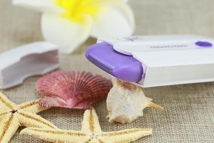 Ženski trimer za telo sa LED lampom i dve glave – slika 7